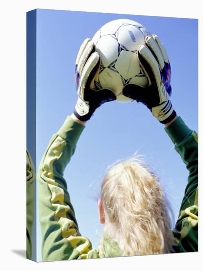 View from Behind of a Girl Holding a Soccer Ball-Steve Cicero-Premier Image Canvas