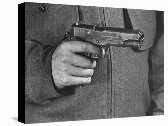 View of a Soldier Holding a US Army Colt Automatic .45 Caliber Pistol-William Vandivert-Premier Image Canvas