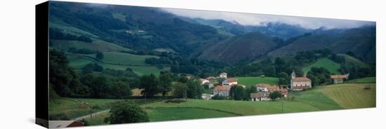 View of houses in a field, Esnazu, Basque Country, Pyrenees-Atlantiques, France-null-Premier Image Canvas