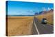 View of landscape and road towards Caleta de Famara, Caleta de Famara, Lanzarote, Las Palmas-Frank Fell-Premier Image Canvas