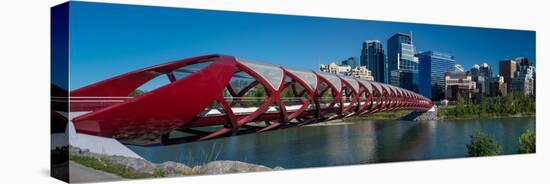 View of Peace Bridge with skylines in the background, Bow River, Calgary, Alberta, Canada-null-Premier Image Canvas