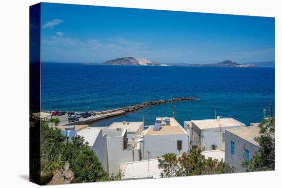 View of rooftops and the sea in the town of Mandraki, Mandraki, Nisyros, Dodecanese, Greek Islands-Frank Fell-Premier Image Canvas