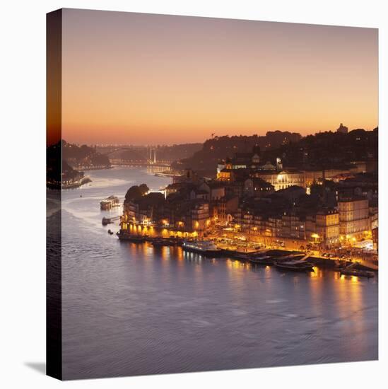 View over Douro River at sunset to Ribeira District, UNESCO World Heritage Site, Porto (Oporto), Po-Markus Lange-Premier Image Canvas