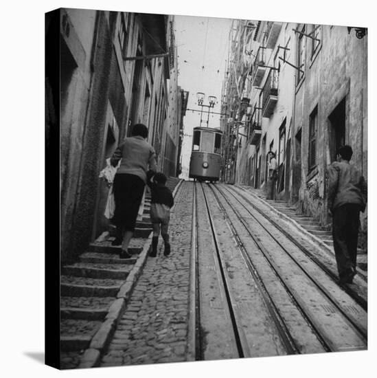 View Showing a Typical Street Scene in Lisbon-Bernard Hoffman-Premier Image Canvas