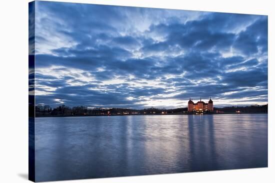 View to the illuminated castle Moritzburg, Saxony, in the early evening hours, blue hour with unusu-UtArt-Premier Image Canvas