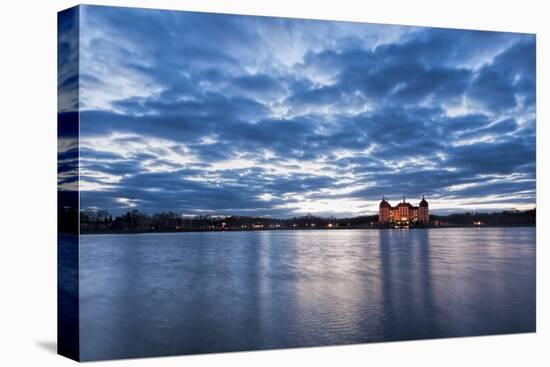 View to the illuminated castle Moritzburg, Saxony, in the early evening hours, blue hour with unusu-UtArt-Premier Image Canvas