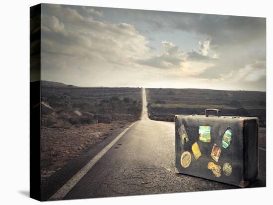 Vintage Suitcase on a Deserted Road-olly2-Premier Image Canvas