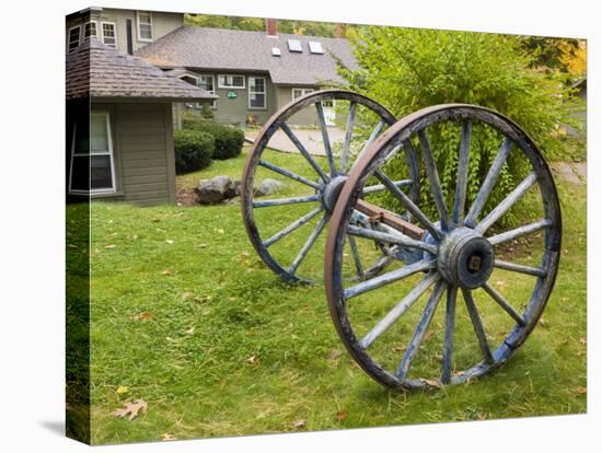 Wagon wheels at Oliver Lodge on Lake Winnipesauke, Meredith, New Hampshire, USA-Jerry & Marcy Monkman-Premier Image Canvas