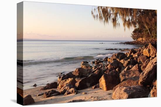 Warm Glow of Sunset on a Boulder-Strewn Beach on Noosa Heads, the Sunshine Coast, Queensland-William Gray-Premier Image Canvas