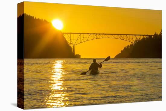 Washington, Woman Sea Kayaker Paddles before the Deception Pass Bridge at Sunset-Gary Luhm-Premier Image Canvas