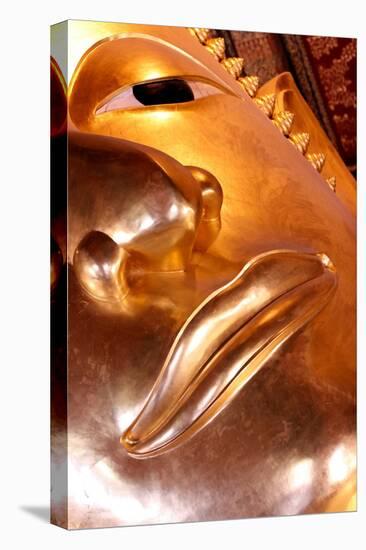 Wat Pho (Temple of the Reclining Buddha), detail of face of big reclining golden Buddha statue-Godong-Premier Image Canvas