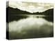 Water Reflecting Bordering Trees and Sky-Jan Lakey-Premier Image Canvas