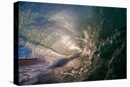 Water shot of a tubing wave off a Hawaiian beach-Mark A Johnson-Premier Image Canvas