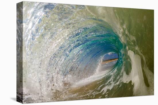 Water shot of a tubing wave off a Hawaiian beach-Mark A Johnson-Premier Image Canvas