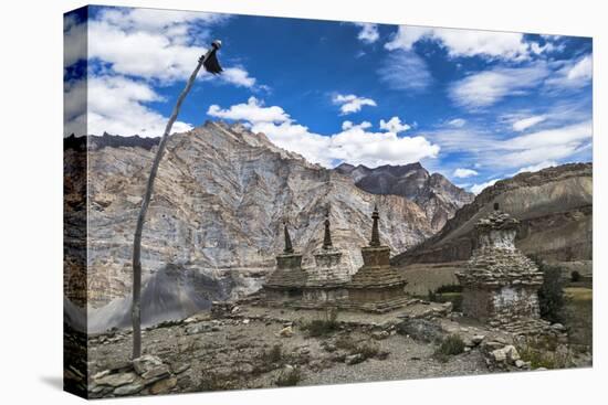 Weathered Buddhist chortens at Neyrak village looking over cliff, Zanskar, India, Himalayas, Asia-Thomas L. Kelly-Premier Image Canvas