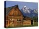 Weathered Wooden Barn Along Mormon Row with the Grand Tetons in Distance, Grand Teton National Park-Dennis Flaherty-Premier Image Canvas