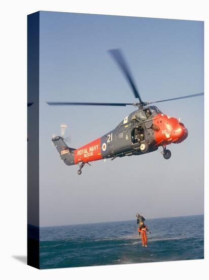 Wessex Helicopter Winching up Survivior in Rescue from Sea-R H Productions-Premier Image Canvas