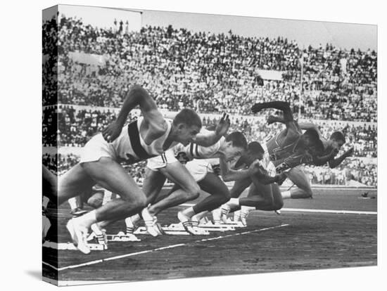 West Germany's Armin Harry, Winner of Men's 100 Meter Dash at Start of Event in Summer Olympics-George Silk-Premier Image Canvas