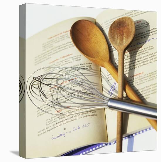 Whisk and Wooden Spoons on Recipe Book-Innerhofer Photodes-Premier Image Canvas