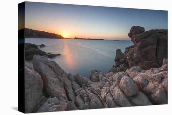 White cliffs and blue sea framed by the lights of sunset Santa Teresa di Gallura, Sardinia, Italy-Roberto Moiola-Premier Image Canvas