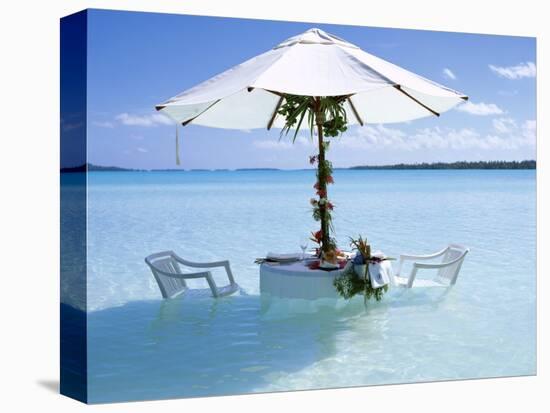 White Table, Chairs and Parasol in the Ocean, Bora Bora (Borabora), Society Islands-Mark Mawson-Premier Image Canvas