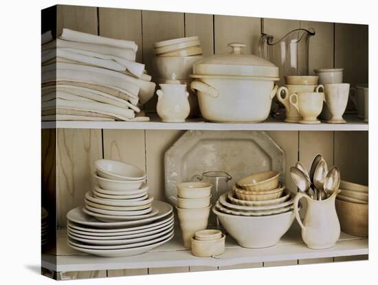 White Tableware and Table Cloths on a Kitchen Shelf-Ellen Silverman-Premier Image Canvas