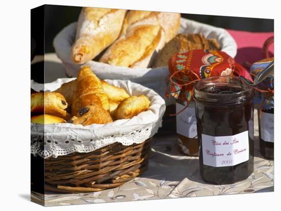 Wicker Basket with Croissants and Breads, Clos Des Iles, Le Brusc, Var, Cote d'Azur, France-Per Karlsson-Premier Image Canvas