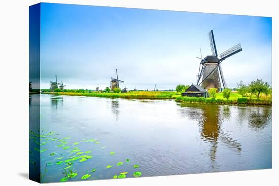 Windmills and Canal in Kinderdijk, Holland or Netherlands. Unesco Site-stevanzz-Premier Image Canvas