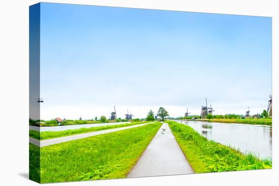 Windmills and Canals in Kinderdijk, Holland or Netherlands. Unesco Site-stevanzz-Premier Image Canvas