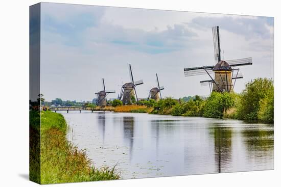 Windmills of Kinderdijk, in the municipality of Molenwaard. UNESCO World Heritage Site since 1997.-Adam Jones-Premier Image Canvas