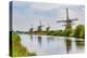 Windmills of Kinderdijk, in the municipality of Molenwaard. UNESCO World Heritage Site since 1997.-Adam Jones-Premier Image Canvas