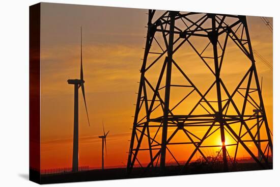 Windmills, pylon and power lines in morning light, Germany, Europe-Hans-Peter Merten-Premier Image Canvas