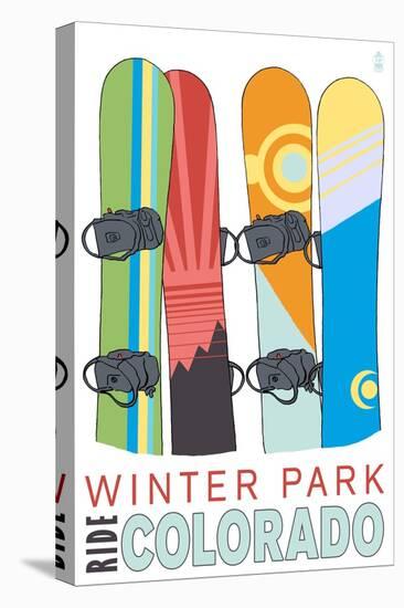 Winter Park, Colorado - Snowboards in Snow-Lantern Press-Stretched Canvas