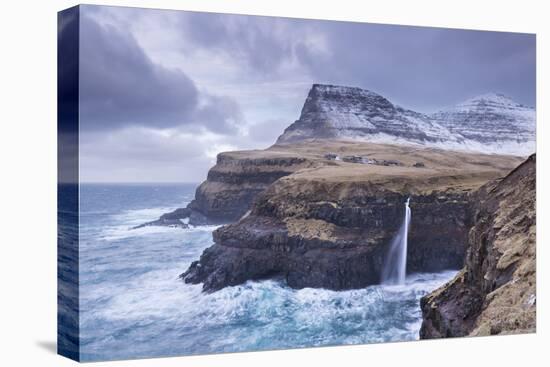 Wintry conditions at Gasadalur on the island of Vagar, Faroe Islands, Denmark, Europe. Winter (Marc-Adam Burton-Premier Image Canvas