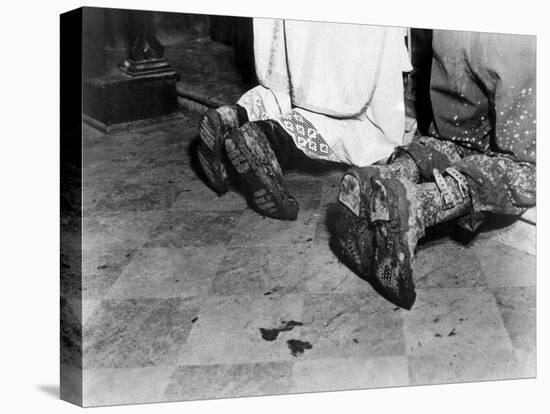 With Soiled Army Boots, a Chaplain and Soldier Kneel at Catholic Mass Is Held for Two Dead Soldiers-null-Stretched Canvas