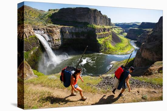 Woman And Man Wear Packs With SUP Gear, Hiking Into The Base Of Palouse Falls For An Afternoon-Ben Herndon-Premier Image Canvas