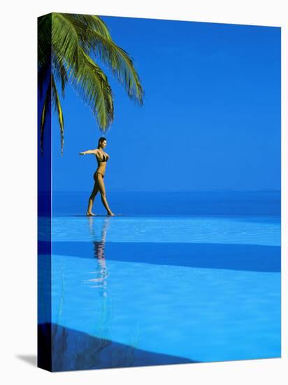 Woman Balancing on Edge of Infinity Pool, Maldives, Indian Ocean-Papadopoulos Sakis-Premier Image Canvas
