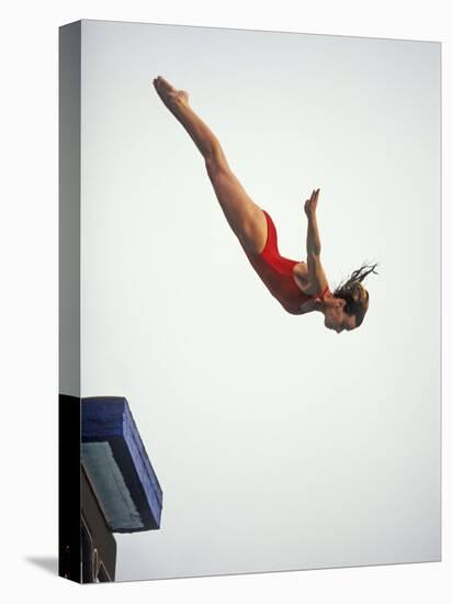 Woman Diver Flying Through the Air, California, USA-Paul Sutton-Premier Image Canvas