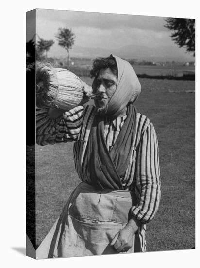 Woman Drinking a Bottles of Wine from a Story Concerning Italy-null-Premier Image Canvas