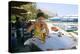 Woman Enjoying a Drink in a Harbourside Taverna, Poros, Kefalonia, Greece-Peter Thompson-Premier Image Canvas