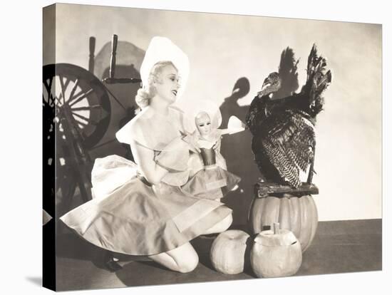 Woman Holding Doll Wearing Identical Thanksgiving Costume-null-Stretched Canvas