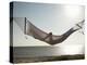 Woman in a Hammock on the Beach, Florida, United States of America, North America-Angelo Cavalli-Premier Image Canvas