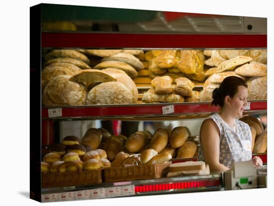 Woman in Bakery, Trogir, Croatia-Russell Young-Premier Image Canvas