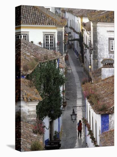 Woman in Narrow Alley with Whitewashed Houses, Obidos, Portugal-Merrill Images-Premier Image Canvas