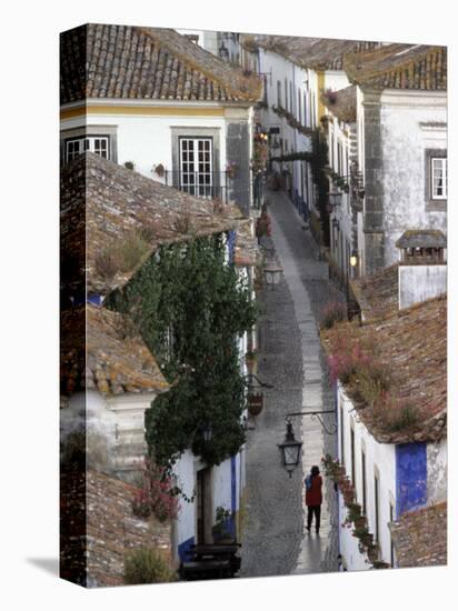 Woman in Narrow Alley with Whitewashed Houses, Obidos, Portugal-Merrill Images-Premier Image Canvas