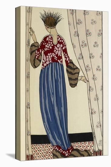 Woman is wearing a red patterend dress with a blue skirt trimmed with fur-Georges Barbier-Premier Image Canvas