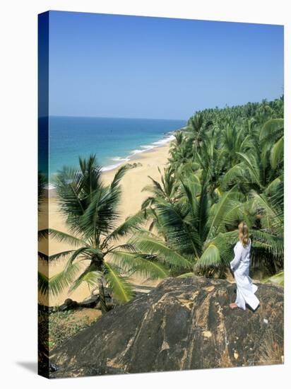 Woman Looking Over Coconut Palms to the Beach, Kovalam, Kerala State, India-Gavin Hellier-Premier Image Canvas