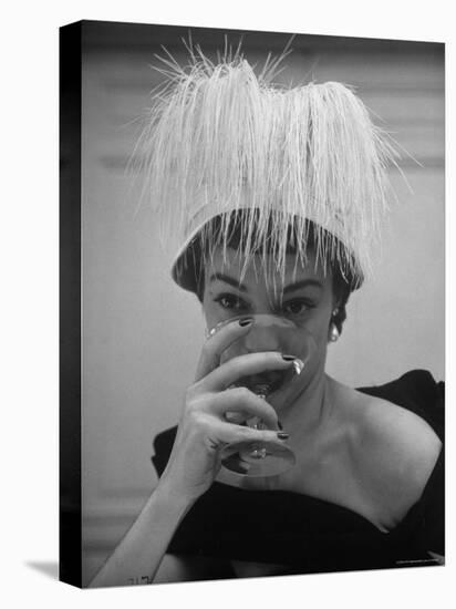 Woman Modeling White Satin Hat, with White Glycerin Feathers to Flatter Low Draped Neckline-Nina Leen-Premier Image Canvas