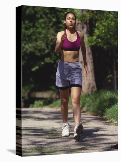 Woman Out on a Fitness Walk-Paul Sutton-Premier Image Canvas