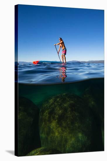 Woman paddleboarding in the lake, Lake Tahoe, Nevada, USA-null-Premier Image Canvas